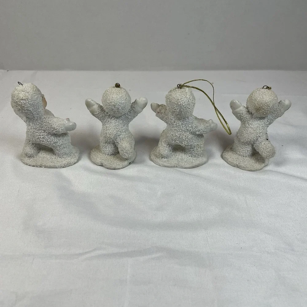 Vtg. Porcelain Snow Baby Figurines Set of 4 Christmas Ornaments Textured White